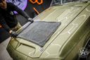 Black Master Drying Towel – Close-up of the large dark grey plush towel being applied to the olive-green car roof panel during drying | Car Detailing | miio Store