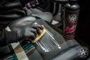 Alcantara Cleaner – Close-up of bristle brush cleaning dark striped alcantara weave texture, showing deep fibre cleaning action | Car Interior | miio Store