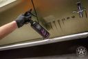 Applying Iron Remover on car paint to dissolve iron contamination